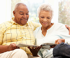couple is reading a magazine together