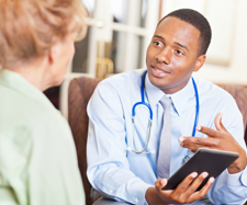 Image of a woman consulting with a doctor